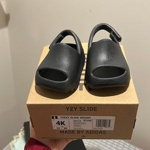 Original Yeezy slides, US Size 4 in babies. Worn 3 times. Brand new.